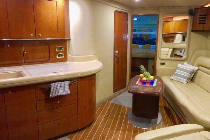 a kitchen with wooden cabinets and a sink