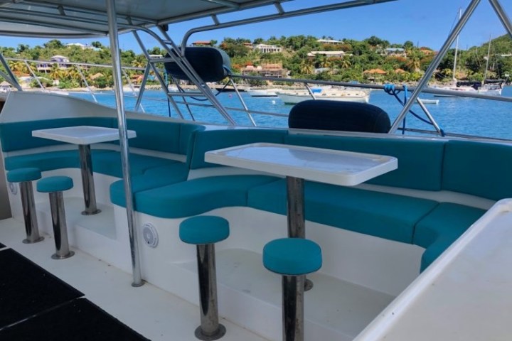 a chair sitting in front of a body of water