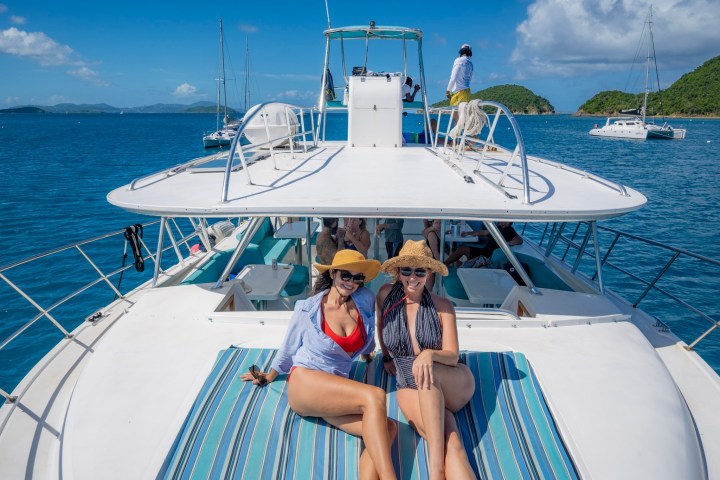 a boat is docked next to a body of water
