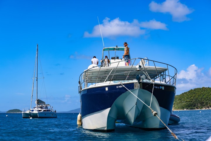 a small boat in a large body of water