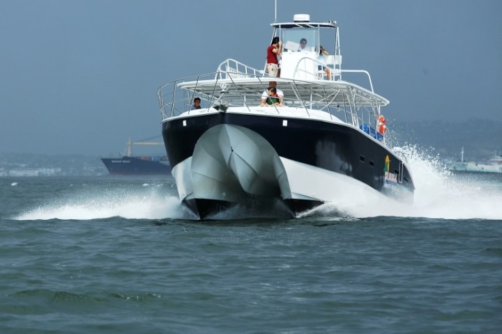 a small boat in a large body of water
