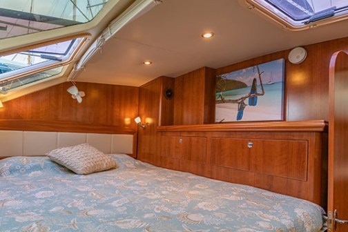 a bedroom with a large bed in a room