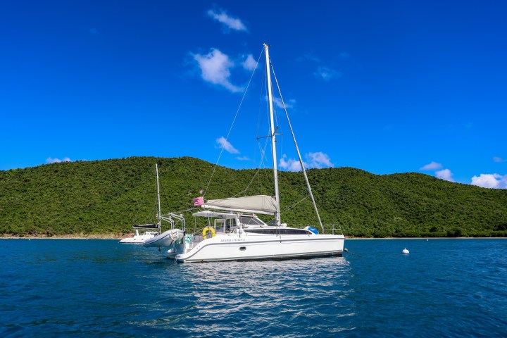 a small boat in a large body of water