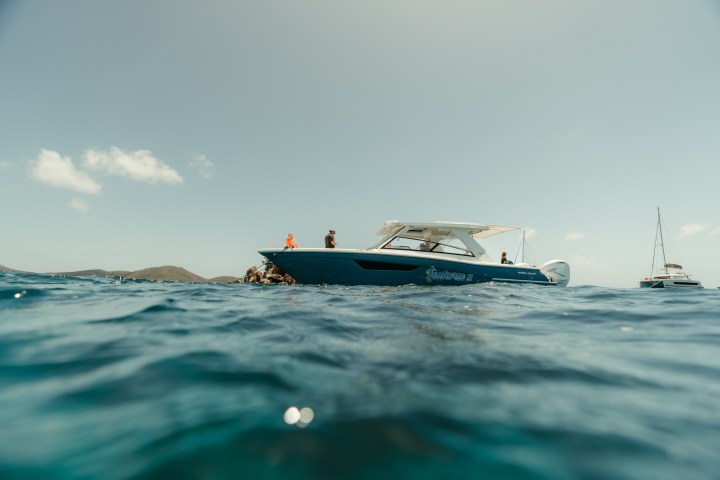 a small boat in a body of water