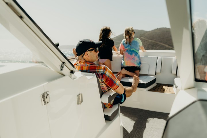 a person standing in front of a mirror posing for the camera